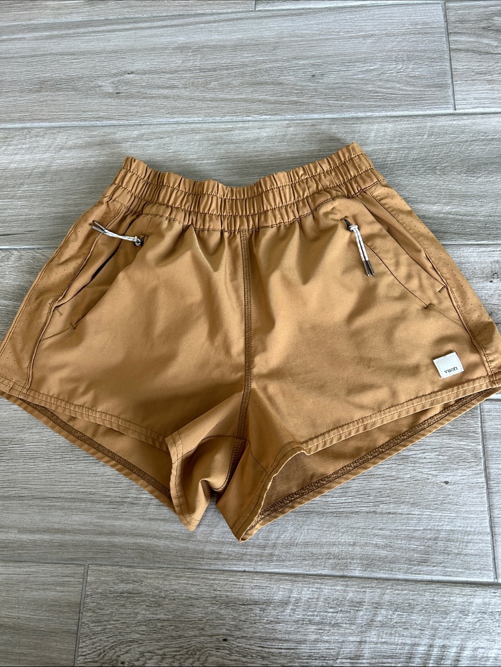 Vuori Women's Tan Performance Shorts with Zippered Pockets